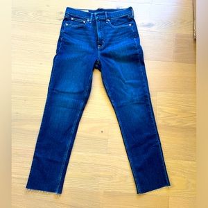 NWOT slim dark wash jeans! Fun gently frayed hem.